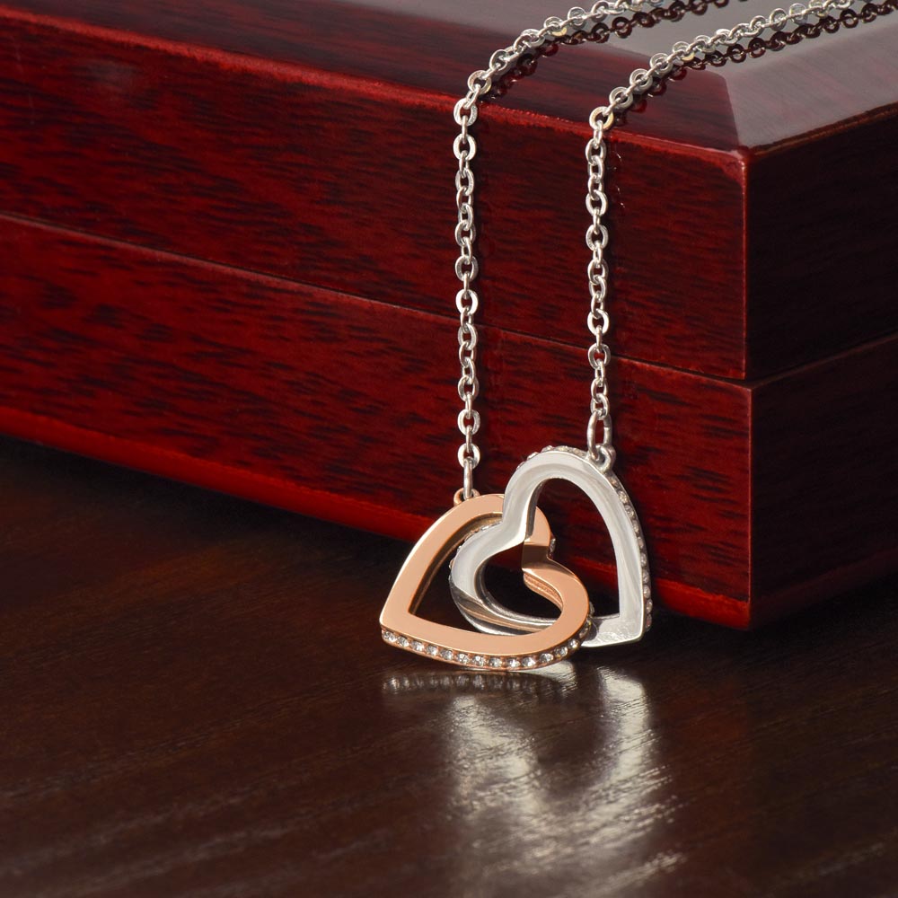 Eternal Embrace: Intertwined Two Hearts as One Necklace